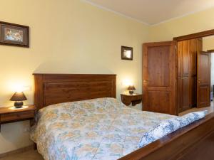 A bed or beds in a room at Apartment Daniele by Interhome