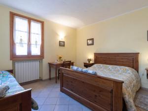A bed or beds in a room at Apartment Daniele by Interhome
