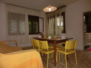 A television and/or entertainment centre at Villa with garden parking and AC