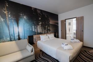 Postel nebo postele na pokoji v ubytování Novotel Vilnius Centre