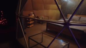 Rúm í herbergi á Annas Glamping