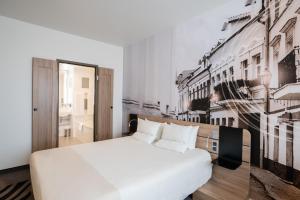 Postel nebo postele na pokoji v ubytování Novotel Vilnius Centre