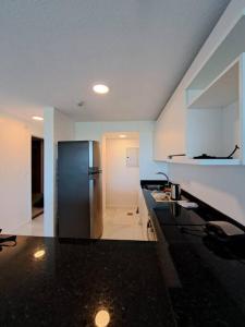 A cozinha ou cozinha compacta de Dpto entero Condominio Altamira