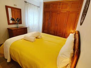 Ένα ή περισσότερα κρεβάτια σε δωμάτιο στο APARTAMENTOs Colón PONDOS +21 φωτογραφίες