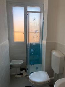 Kylpyhuone majoituspaikassa Casa vacanze Sogni Proibiti