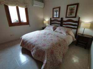 Posteľ alebo postele v izbe v ubytovaní Casa Alfonso Toledo Más que una casa, un hogar