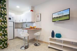 Una cocina o cocineta en Puccini Oasis - La Bohème