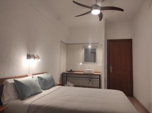 Posteľ alebo postele v izbe v ubytovaní Hostal Nadal