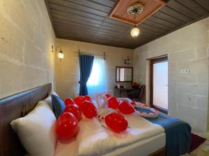 Postel nebo postele na pokoji v ubytování Virtus Cappadocia Hotel Göreme