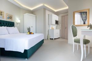 Postel nebo postele na pokoji v ubytování Light Blue Hotel