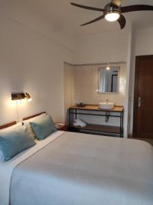 Posteľ alebo postele v izbe v ubytovaní Hostal Nadal