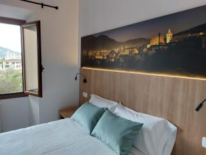 Posteľ alebo postele v izbe v ubytovaní Hostal Nadal