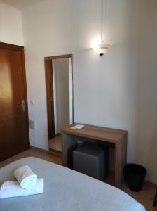 Posteľ alebo postele v izbe v ubytovaní Hostal Nadal