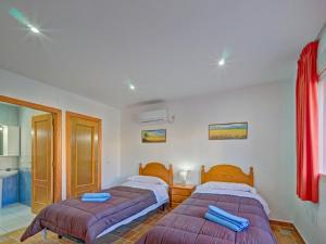 Posteľ alebo postele v izbe v ubytovaní Apartment Canuta Baja-7 by Interhome