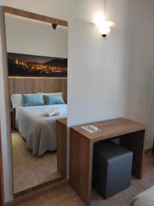 Posteľ alebo postele v izbe v ubytovaní Hostal Nadal