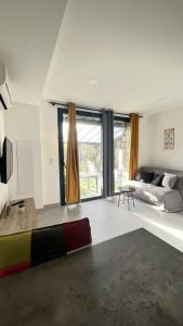 Posteľ alebo postele v izbe v ubytovaní N10 Maison T2 climatisé avec jacuzzi privé