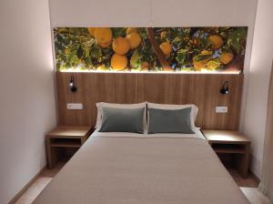 Posteľ alebo postele v izbe v ubytovaní Hostal Nadal