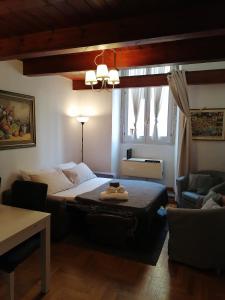 Posteľ alebo postele v izbe v ubytovaní Coronari 45 apartment