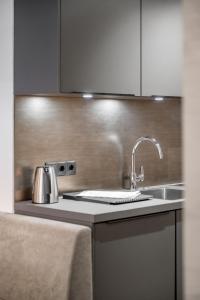 Kuchyň nebo kuchyňský kout v ubytování Appartements Perberschlager