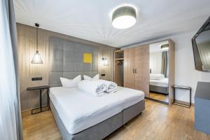 Postel nebo postele na pokoji v ubytování Appartements Perberschlager