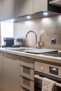 Kuchyň nebo kuchyňský kout v ubytování Appartements Perberschlager