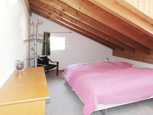 Postel nebo postele na pokoji v ubytování Apartment Dorfstrasse 53a - 2 by Interhome