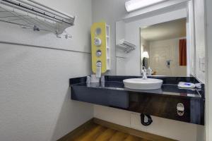 a bathroom with a sink and a mirror at Motel 6-Chino, CA - Los Angeles Area in Chino
