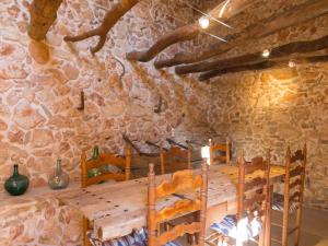 A restaurant or other place to eat at Holiday Home Can Xerret by Interhome