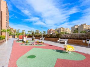 Plac zabaw dla dzieci w obiekcie Apartment Torremar-1 by Interhome
