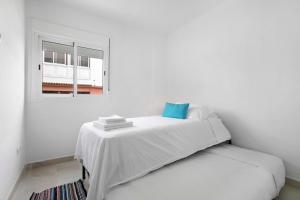 Posteľ alebo postele v izbe v ubytovaní Buganvilla 0-1