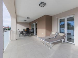 En balkon eller terrasse på Apartment Villa Galici-1 by Interhome