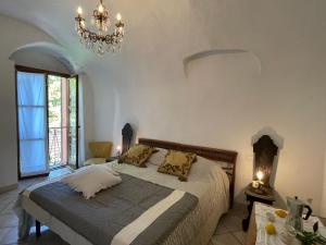 Säng eller sängar i ett rum på Apartment Antonella by Interhome
