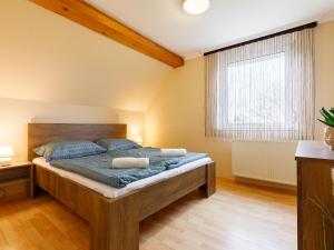 Posteľ alebo postele v izbe v ubytovaní Apartment Domi by Interhome