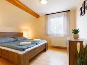 Posteľ alebo postele v izbe v ubytovaní Apartment Domi by Interhome
