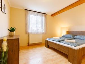 Posteľ alebo postele v izbe v ubytovaní Apartment Domi by Interhome