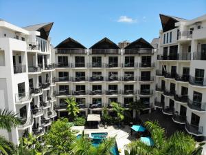 an aerial view of a large apartment building at PACIFIC SUITES Boutique Hotel and Bistro in Jacó