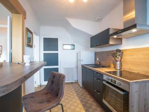 Kuchnia lub aneks kuchenny w obiekcie Holiday Home La longue vue by Interhome