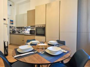 A kitchen or kitchenette at Apartment NoLo Flat by Interhome