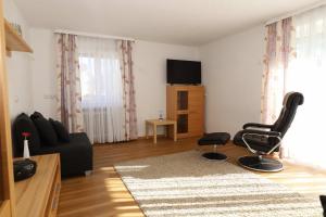 TV a/nebo společenská místnost v ubytování KAISERS das kleine Stadthotel