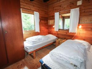 Postel nebo postele na pokoji v ubytování Holiday Home Lone - 900m from the sea by Interhome