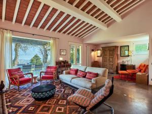 a living room with a couch and chairs at Villa Villa Ulivo by Interhome in Griante Cadenabbia