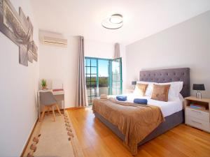Postel nebo postele na pokoji v ubytování Holiday Home De Verão by Interhome