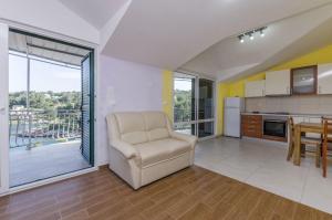 Kuchyňa alebo kuchynka v ubytovaní Apartment Ivo
