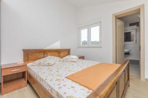Posteľ alebo postele v izbe v ubytovaní Apartment Ivo