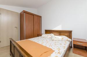 Posteľ alebo postele v izbe v ubytovaní Apartment Ivo
