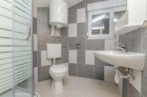 Kúpeľňa v ubytovaní Apartment Ivo