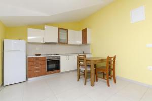 Kuchyňa alebo kuchynka v ubytovaní Apartment Ivo