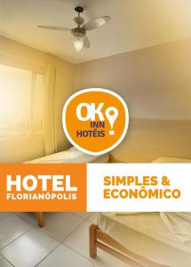 uma imagem de um logótipo de hotel e dois logótipos em Ok Inn Hotel Floripa - SOB NOVA GESTÃO em Florianópolis