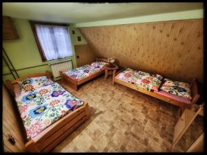 Postel nebo postele na pokoji v ubytování Noclegi u Marka