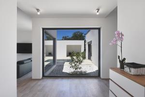Μια τηλεόραση ή/και κέντρο ψυχαγωγίας στο Vila Nauta - luxury in Vintijan, near Pula